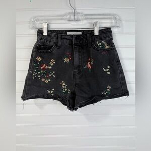 Banjara women’s faded black floral embroidered cutoff denim shorts. Size 00/22